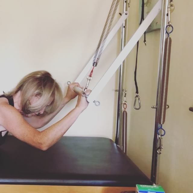 Beautiful back extension using push through bar 🏼. Not an easy move. Outstanding job Ms Lynnie  #backextension #pilatescadillac #advanced #proudinstructor